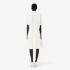 Runway-pologenser med plissering og broderidetaljer
