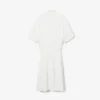Runway-pologenser med plissering og broderidetaljer