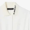 Runway-pologenser med plissering og broderidetaljer
