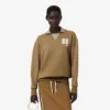 Runway-pologensere med krage og badge-detalj