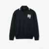 Runway-pologensere med krage og badge-detalj