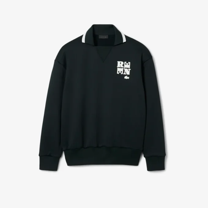 Runway-pologensere med krage og badge-detalj