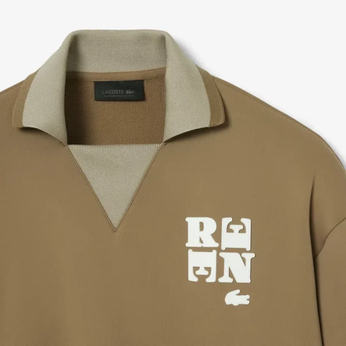 Runway-pologensere med krage og badge-detalj