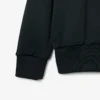 Runway-pologensere med krage og badge-detalj