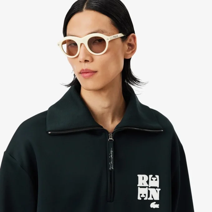 Runway-sweatshirt med høy hals, glidelås og badge-detalj