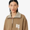 Runway-sweatshirt med høy hals, glidelås og badge-detalj