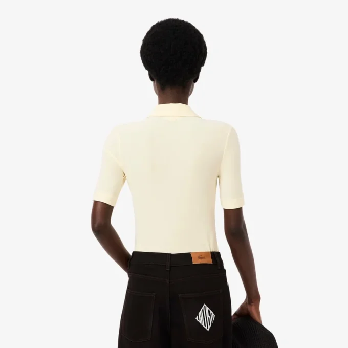 Slim fit-polo med broderi