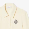 Slim fit-polo med broderi