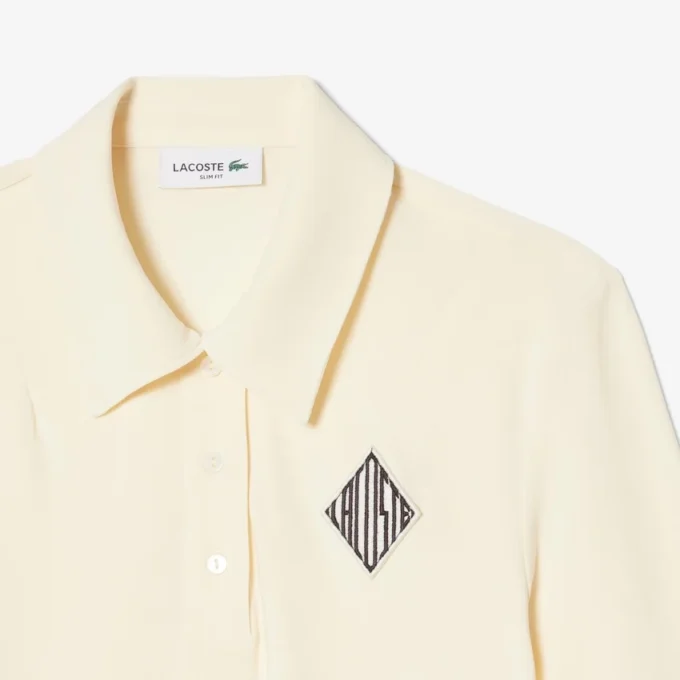 Slim fit-polo med broderi