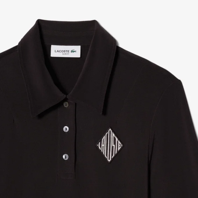 Slim fit-polo med broderi