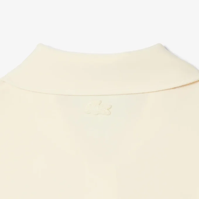 Slim fit-polo med broderi