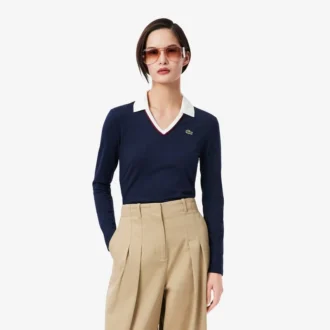 Slim fit-pologensere med detaljer og lange ermer for kvinner