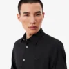 Slim fit-skjorte med knapper i stretch for menn