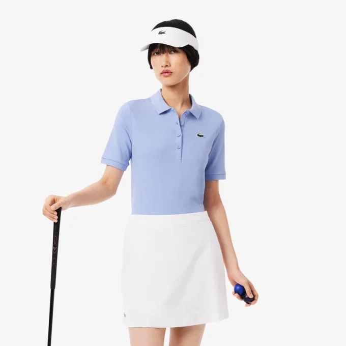 Slim fit termoregulerende golfpolo for kvinner