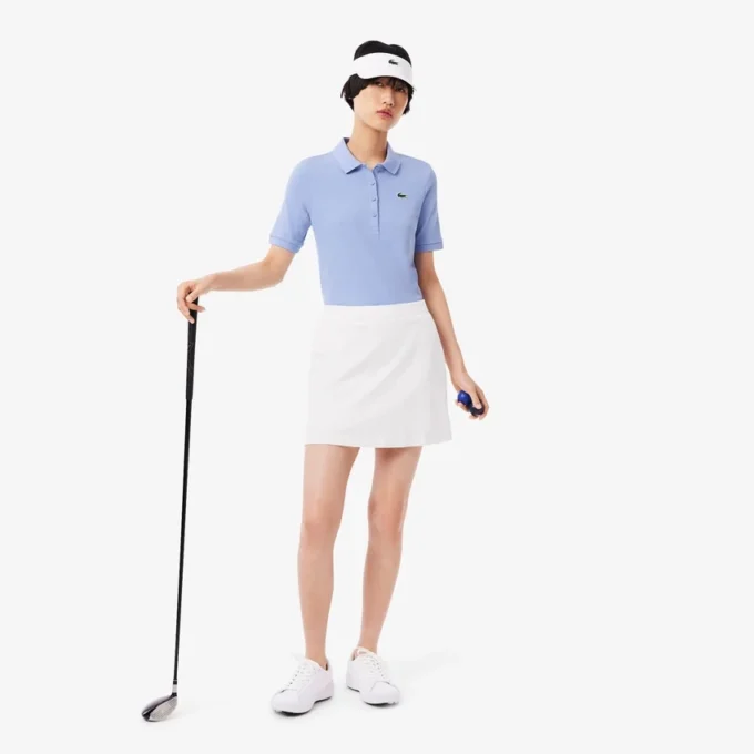 Slim fit termoregulerende golfpolo for kvinner