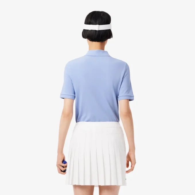 Slim fit termoregulerende golfpolo for kvinner