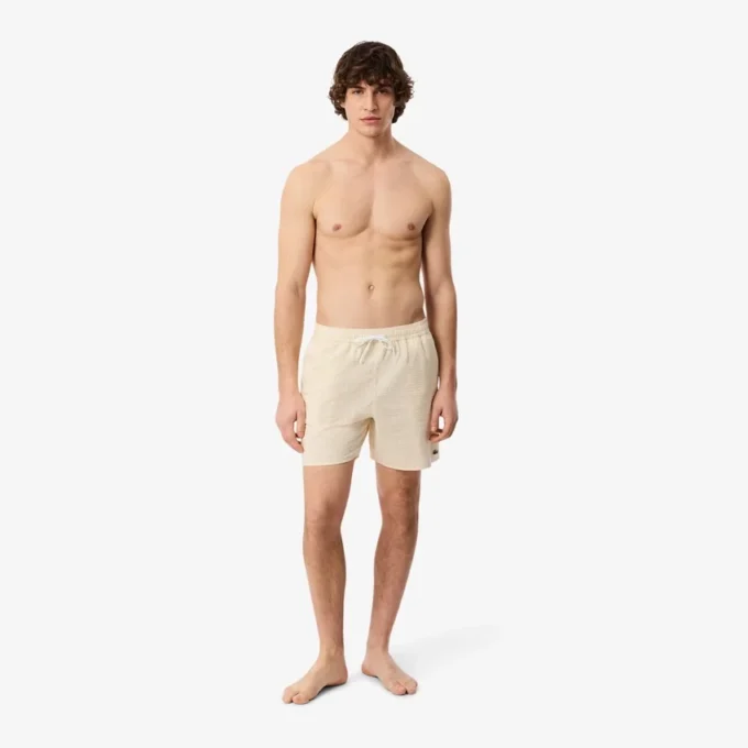 Stripete badetrunks i mellomlengde med struktur for menn