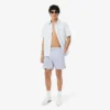 Stripete badetrunks i mellomlengde med struktur for menn