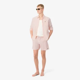 Stripete badetrunks i mellomlengde med struktur for menn