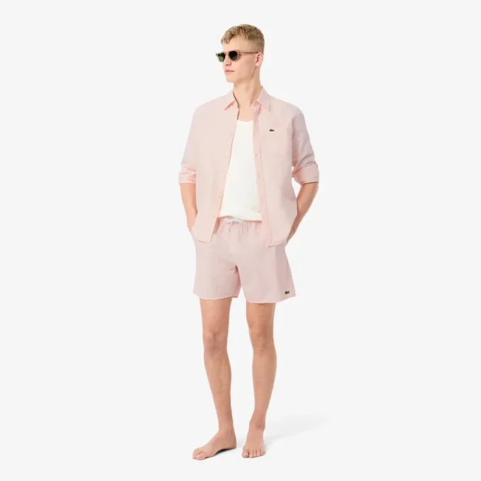 Stripete badetrunks i mellomlengde med struktur for menn