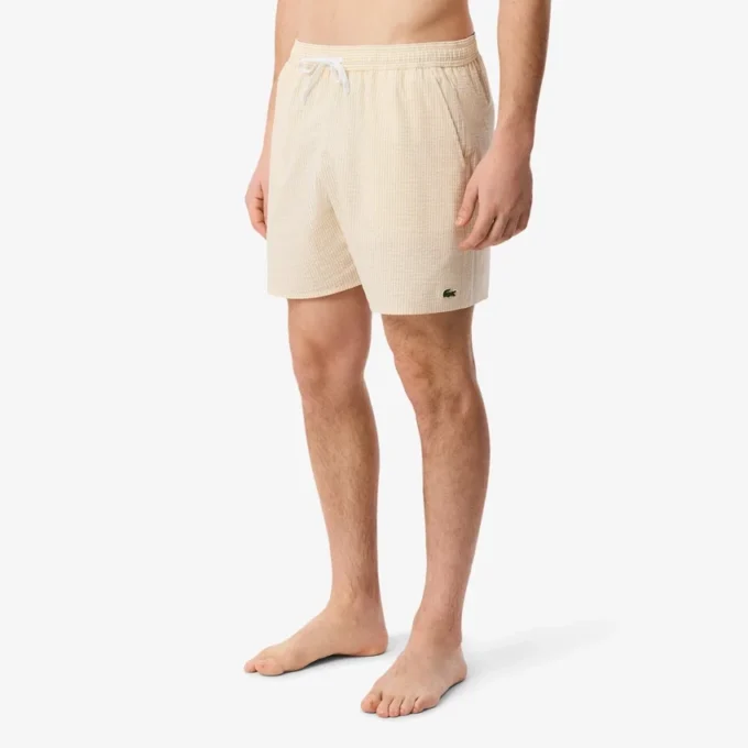 Stripete badetrunks i mellomlengde med struktur for menn