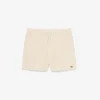 Stripete badetrunks i mellomlengde med struktur for menn