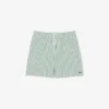 Stripete badetrunks i mellomlengde med struktur for menn