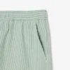 Stripete badetrunks i mellomlengde med struktur for menn