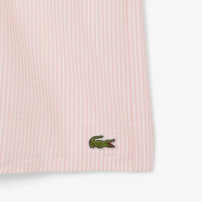 Stripete badetrunks i mellomlengde med struktur for menn
