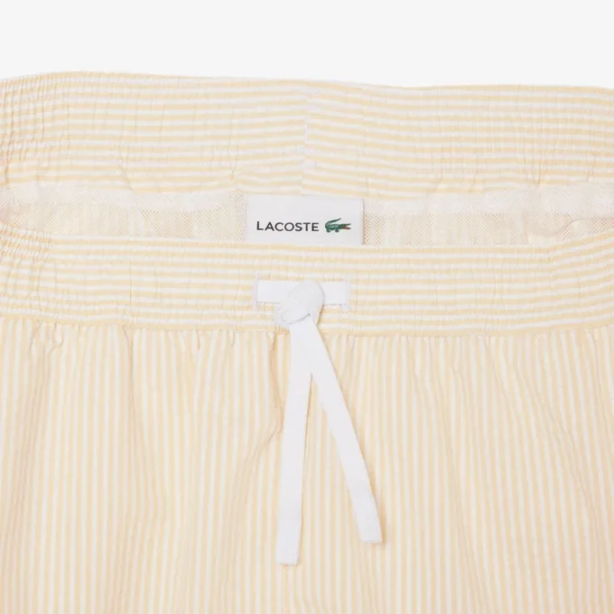 Stripete badetrunks i mellomlengde med struktur for menn