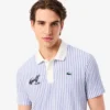 Termoregulerende stripet golfpolo for menn