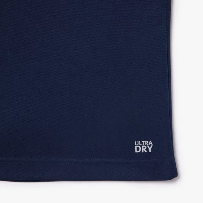 Ultra Dry Piqua-tennispolo for menn med normal passform