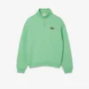 Unisex-sweatshirt med løs passform, badge-detaljer og halv glidelås