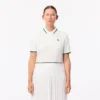 Uv-beskyttende tennis-pologensere med stripet krage for kvinner