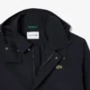 Vannavvisende parkas med hette i mellomlengde for menn