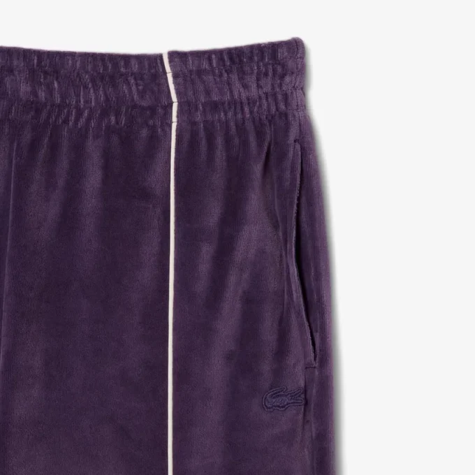 Velour-joggebukse med dekorative detaljer for kvinner