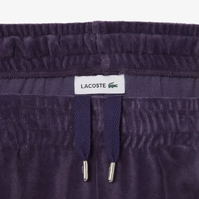 Velour-joggebukse med dekorative detaljer for kvinner