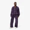 Velour-joggebukse med dekorative detaljer for kvinner