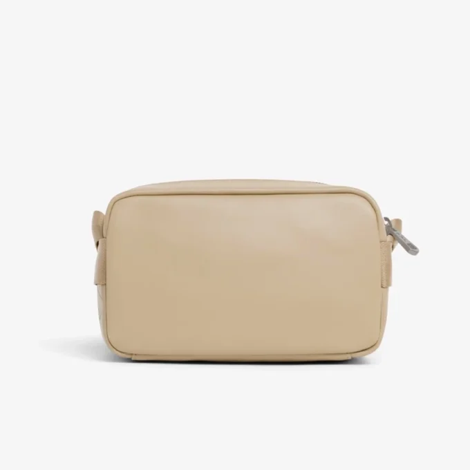 Vertikal skinnveske med monogram