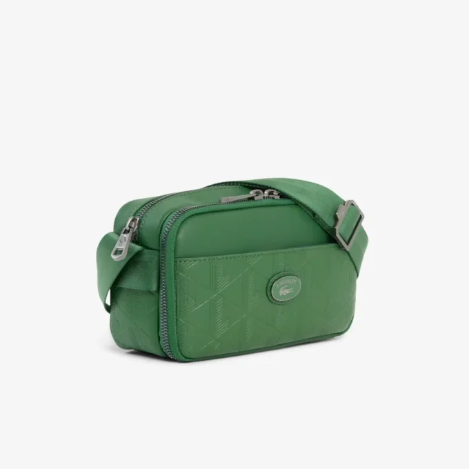 Vertikal skinnveske med monogram