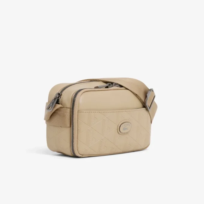 Vertikal skinnveske med monogram