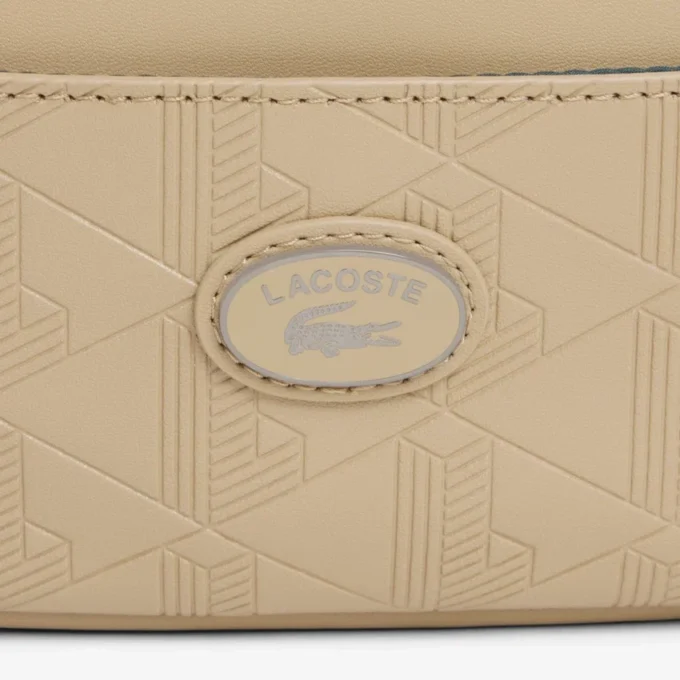 Vertikal skinnveske med monogram